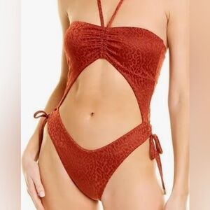 NWOT BCBGMAXAZRIA cutout copper leopard one piece. Size 8. Never been worn.